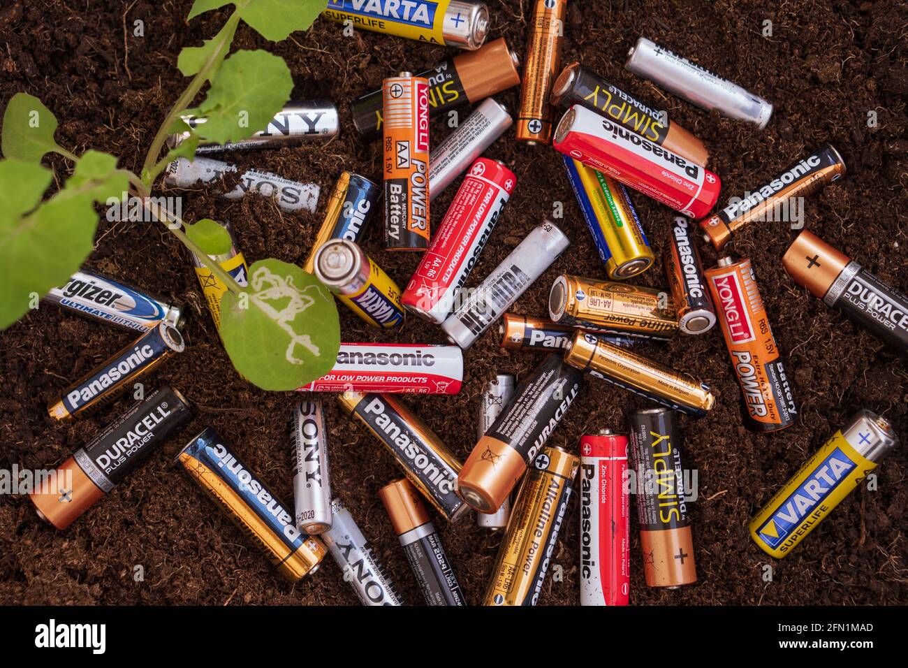 SANTA MARIA CAPUA VETERE, ITALY - May 01, 2021: Used Batteries on ground,  concept of toxic waste and pollution. Caserta, Italy, May 01th 2021 Stock  Photo - Alamy