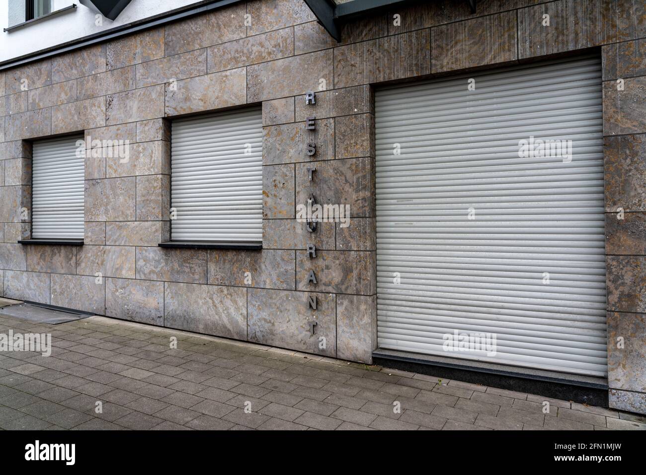 Façade of a restaurant, closed gastronomy, during the third lockdown in the Corona crisis, Oberhausen, NRW, Germany Stock Photo