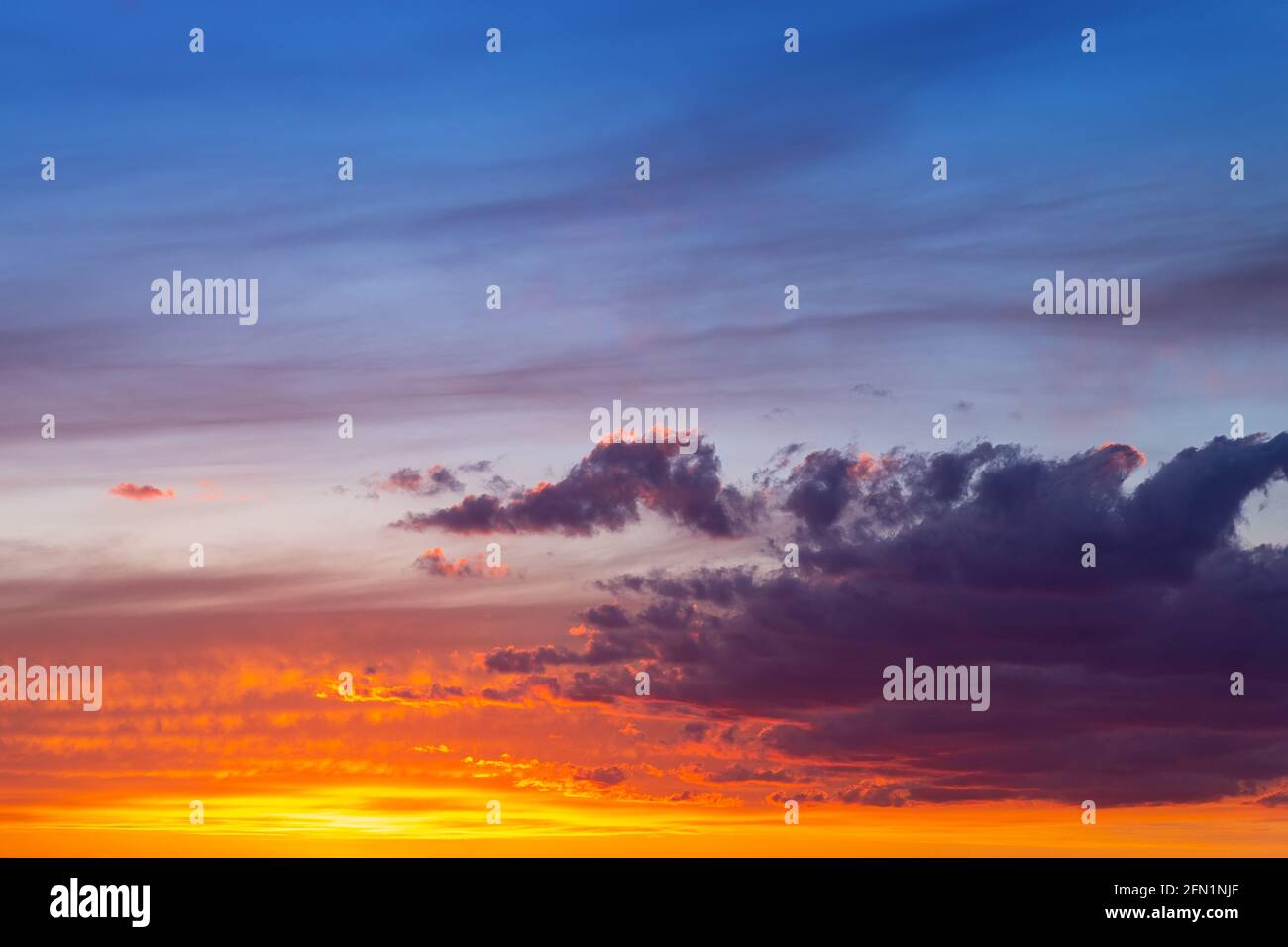 Dramatic colorful red orange to dark blue sunset or sunrise sky ...