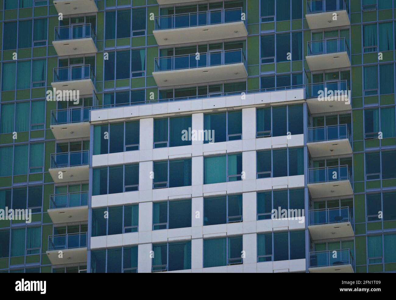 Photo inspiration: Fresh Look at Residential Condominiums Complex Facade With Symmetrical White Concrete