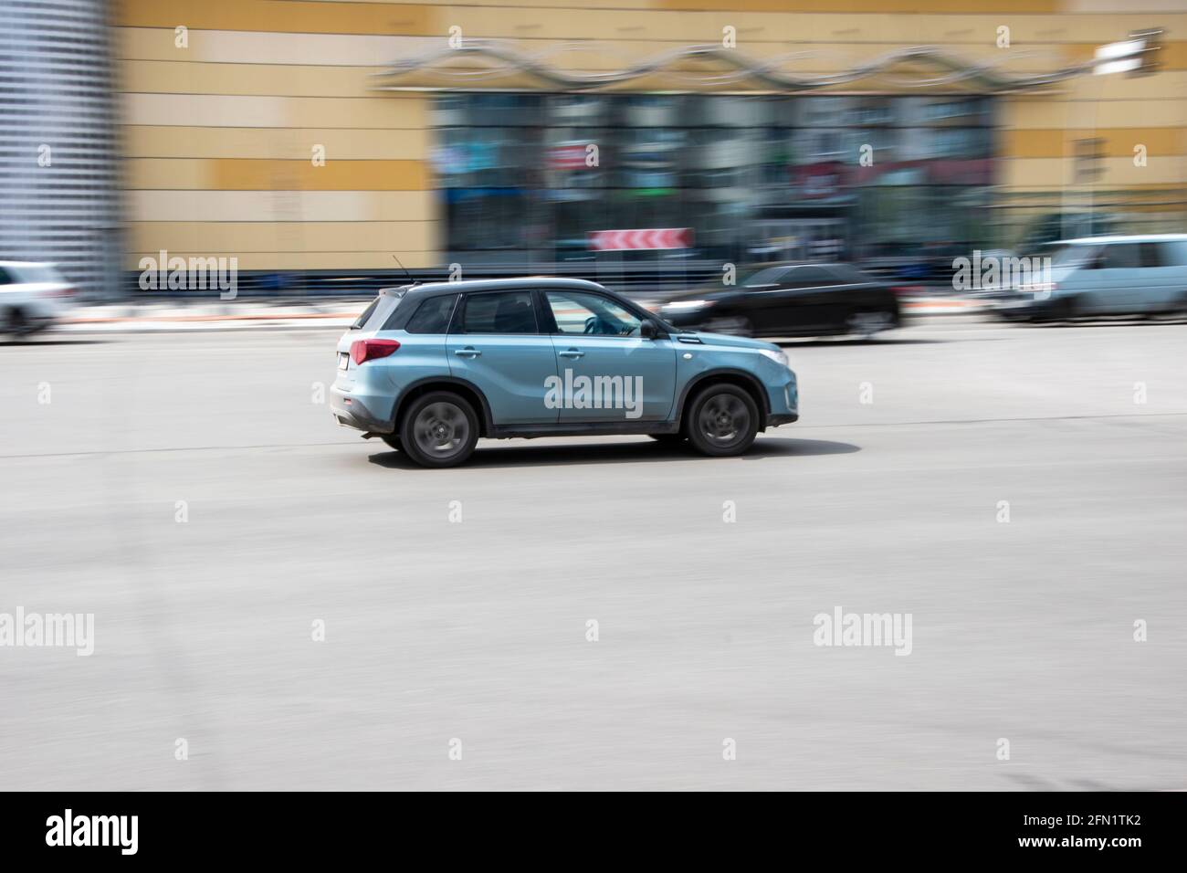Ukraine, Kyiv - 26 April 2021: Silver Suzuki Vitara car moving on the street. Editorial Stock Photo