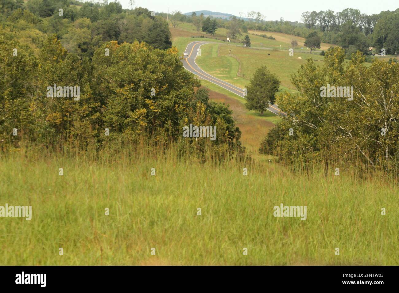 Landscape in Appomattox, VA, with State Road 24 running over a hilly land. Stock Photo