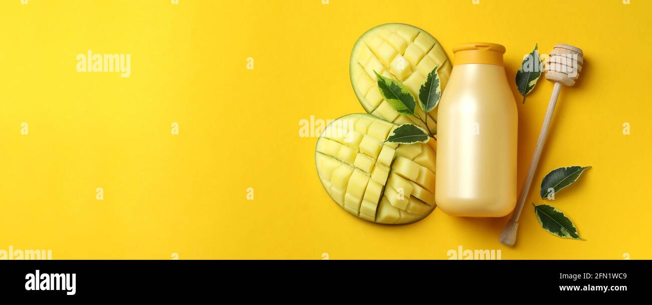 Natural mango shower gel and ingredients on yellow background Stock Photo Alamy