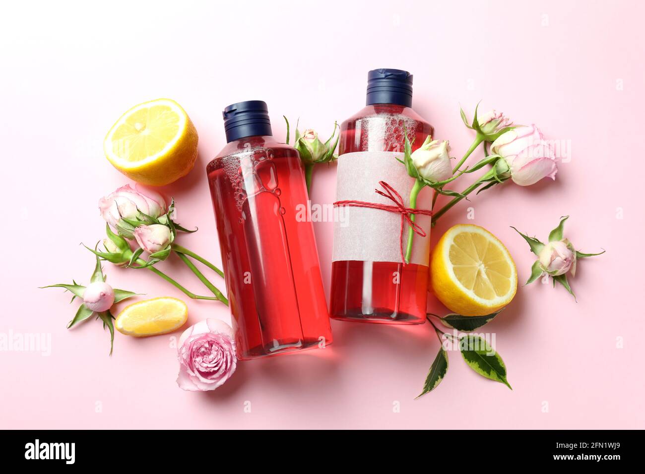 Natural shower gels and ingredients on pink background Stock Photo Alamy