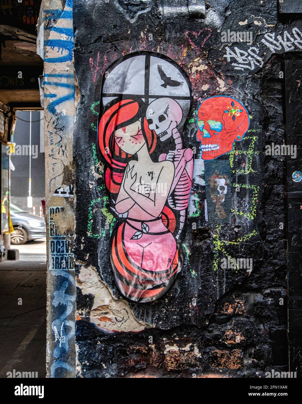 Street art & graffiti on dilapidated wall of Haus Schwarzenberg art & culture venue, 39 Rosenthaler Strasse, Mitte, Berlin,Germany. Woman & skulls Stock Photo