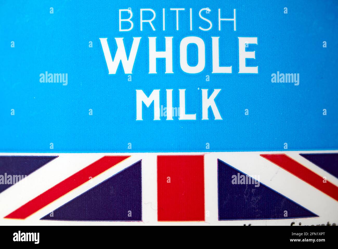 union flag label on a bottle of british whole milk Stock Photo