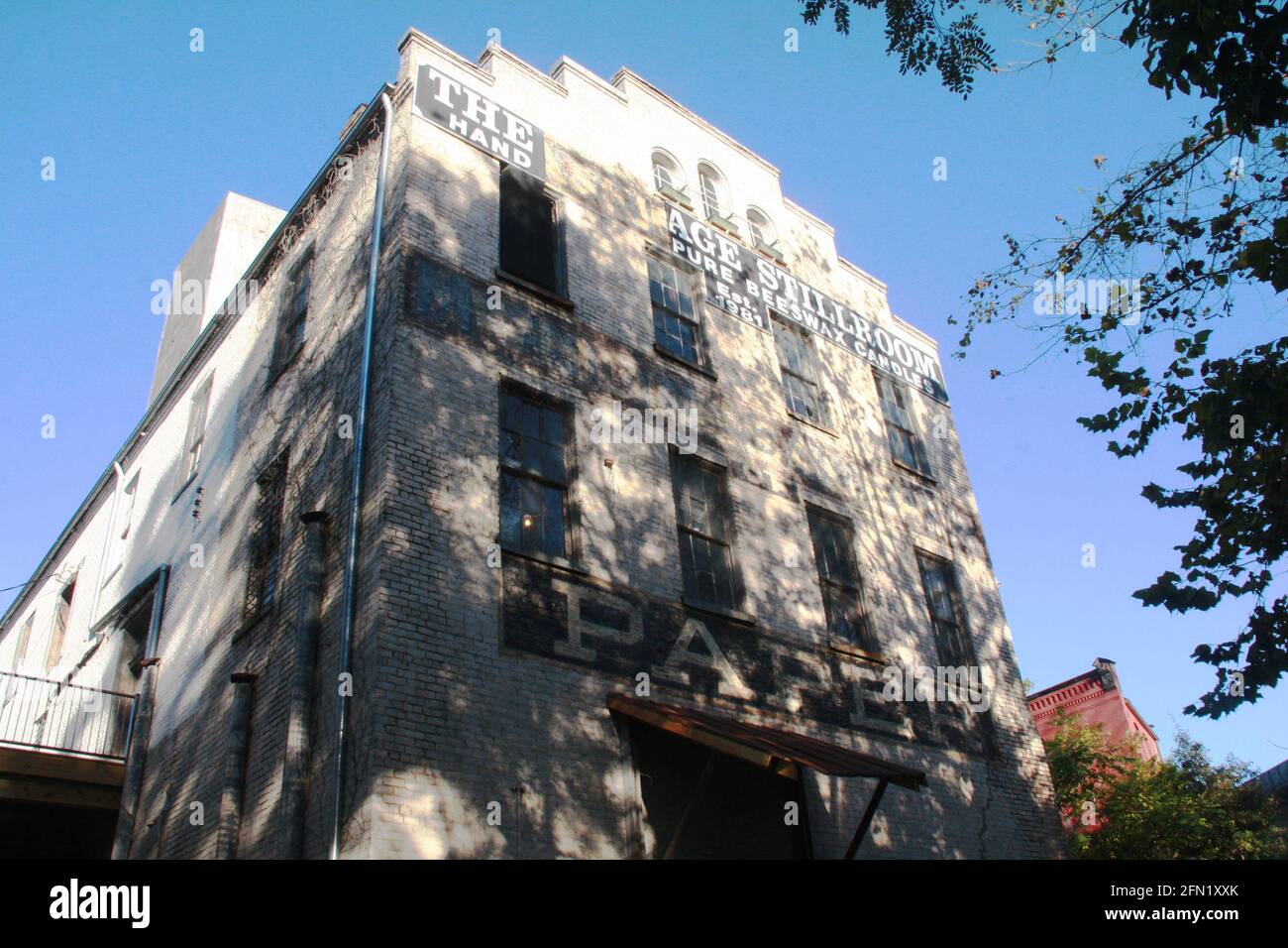 Old brick building used in time for various businesses in downtown
