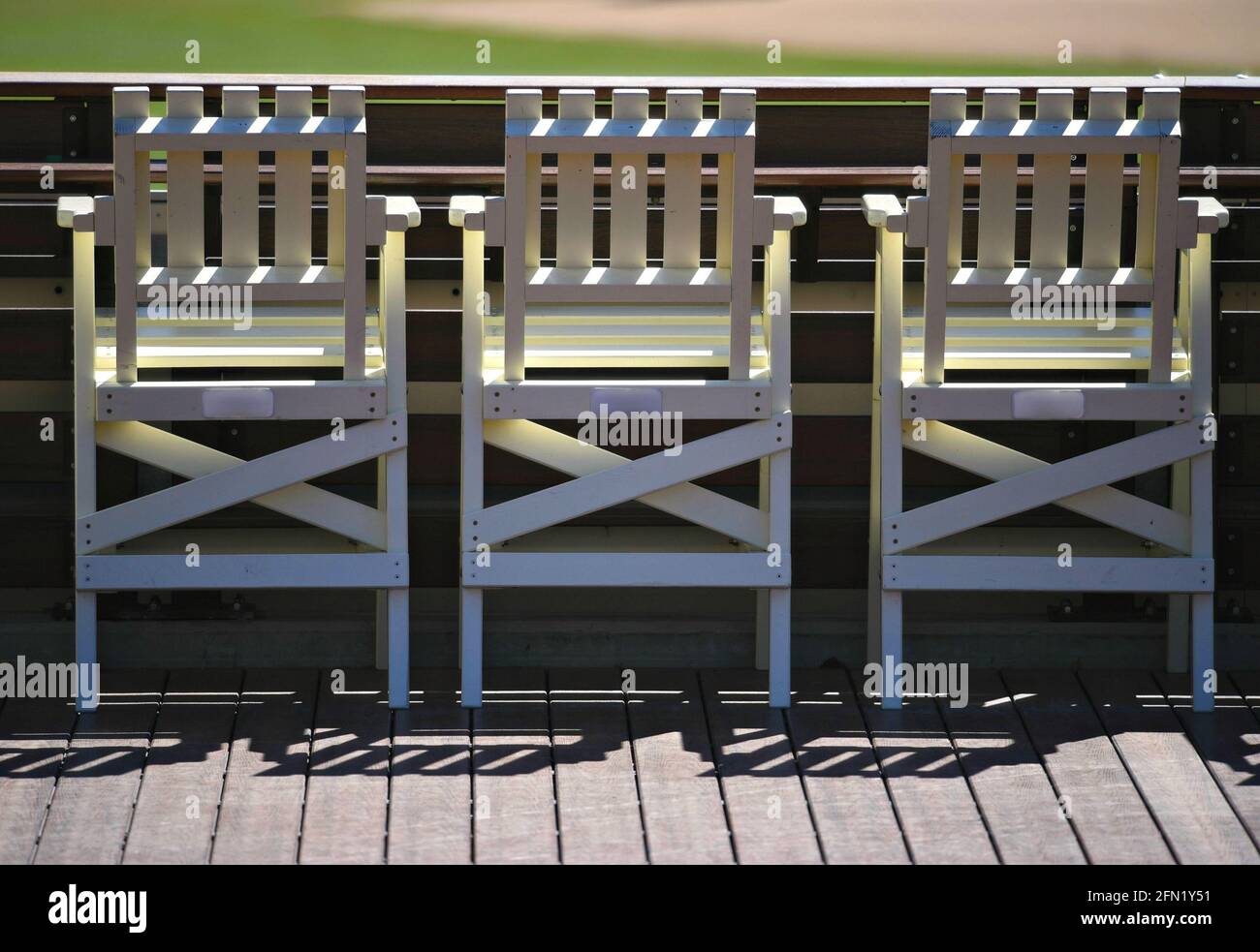 Beach style chairs line the edge of Sun Diego Beach at the right field wall of Petco Park, the Padres Baseball Stadium in San Diego, California USA. Stock Photo