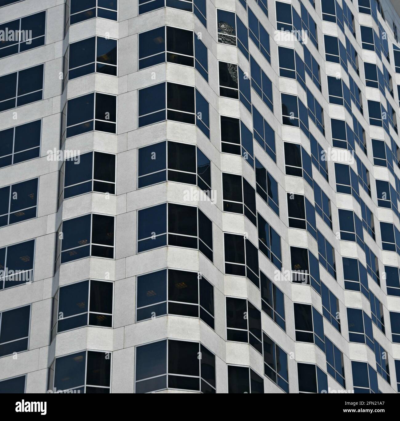 High-rise residential condominiums complex facade with symmetrical ...