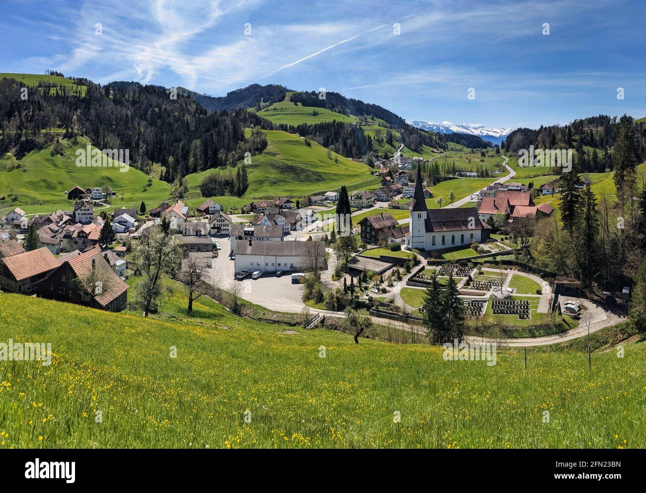 panorama picture of the small fischenthal in switzerland. lush green hills in the zurich oberland. recreation area swiss Stock Photo