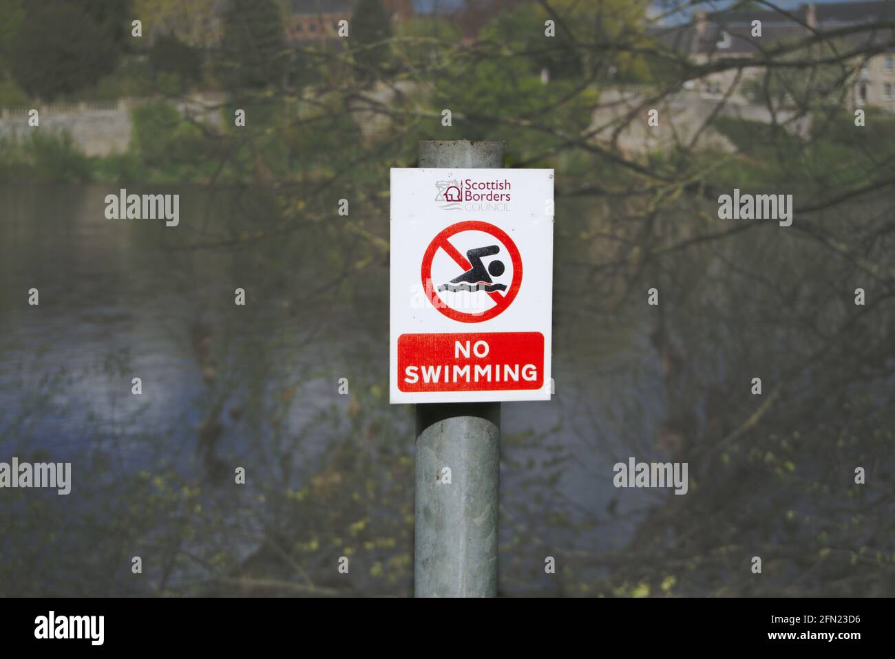 Scottish Borders Council No Swimming sign beside the River Tweed in Kelso, Roxburghshire, Scottish Borders, Scotland, UK. Stock Photo