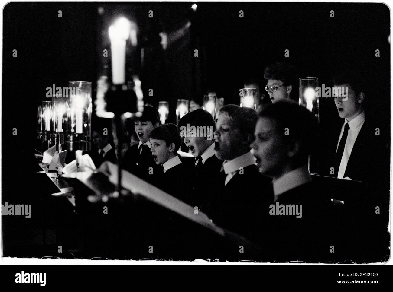 Kings College Chapel Choir December 1992 scanned 2021 Photographed in the lead up to the traditional Festival of Nine Carols in King’s College under the musical directorship of Stephen Cleobury, later Sir Stephen. Sire Stephen died in 2019. Sir Stephen John Cleobury CBE  was an English organist and music director. He worked with the Choir of King's College, Cambridge, where he served as music director from 1982 to 2019 The Choir of King's College, Cambridge is an English choir. It is considered one of today's most accomplished and renowned representatives of the great English choral tradition. Stock Photo