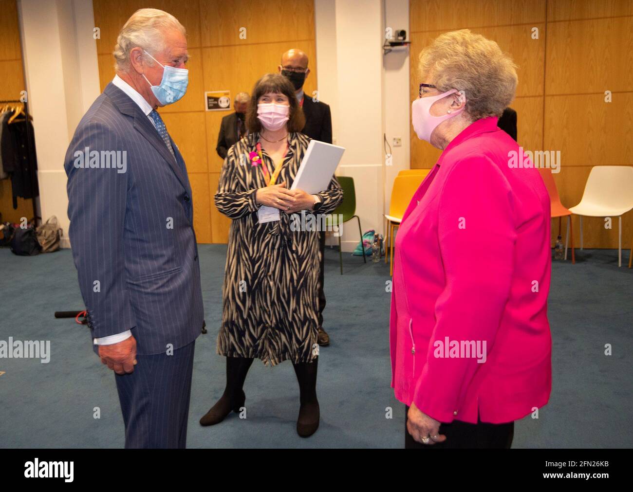 The Prince of Wales meets Audrey Phillips (78) from Stanmore during a visit to the the Breast Cancer Now Toby Robins Research Centre in London, 21 years after he formally opened the research centre. During the visit Charles heard about the charity's achievements and how Covid-19 has impacted their funded research. Picture date: Thursday May 13, 2021. Stock Photo