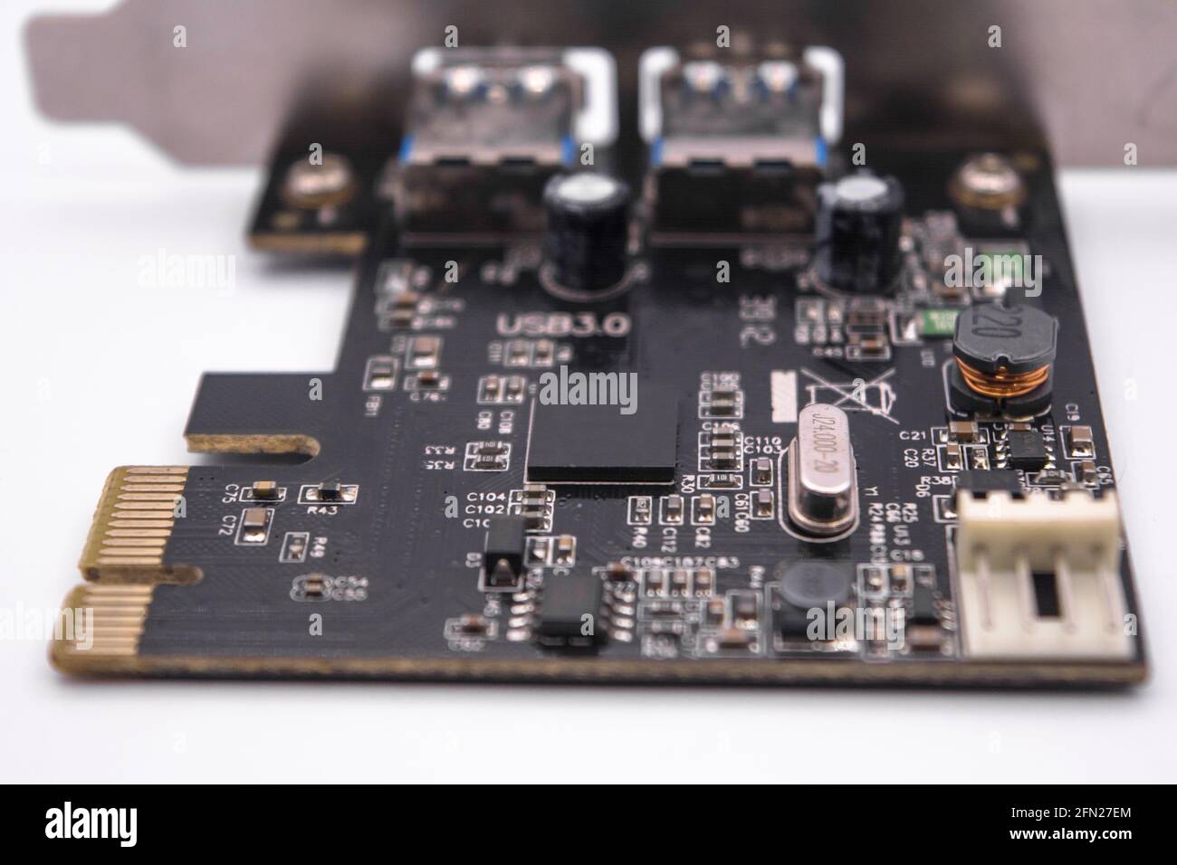 Computer PCI-E to USB 3.0 Expasion Card on white background. PCI-Express card for connectors additional USB 3.0, isolated on white  background. Stock Photo