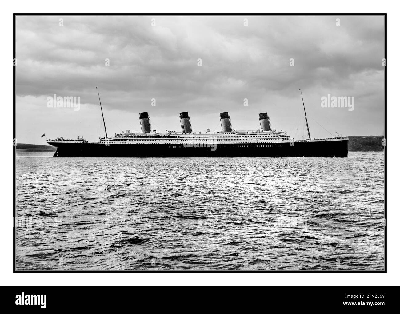 TITANIC 1912 RMS Titanic in Cobh Harbour (Queenstown) Date 11 April 1912 British transatlantic steamer, Built in Belfast at the Harland & Wolff shipyard from 1909 to 1912 by order of the shipping company White Star Line. At the time of commissioning, it was the largest vessel in the world. On the night of April 14-15, 1912, during the maiden voyage, it sank in the North Atlantic, after striking an iceberg. Stock Photo