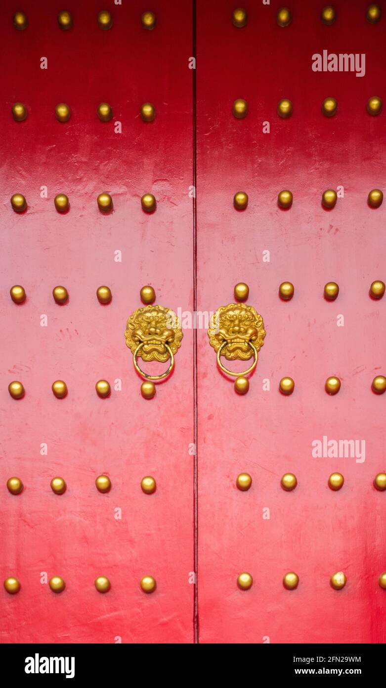 Ancient red door closed Stock Photo