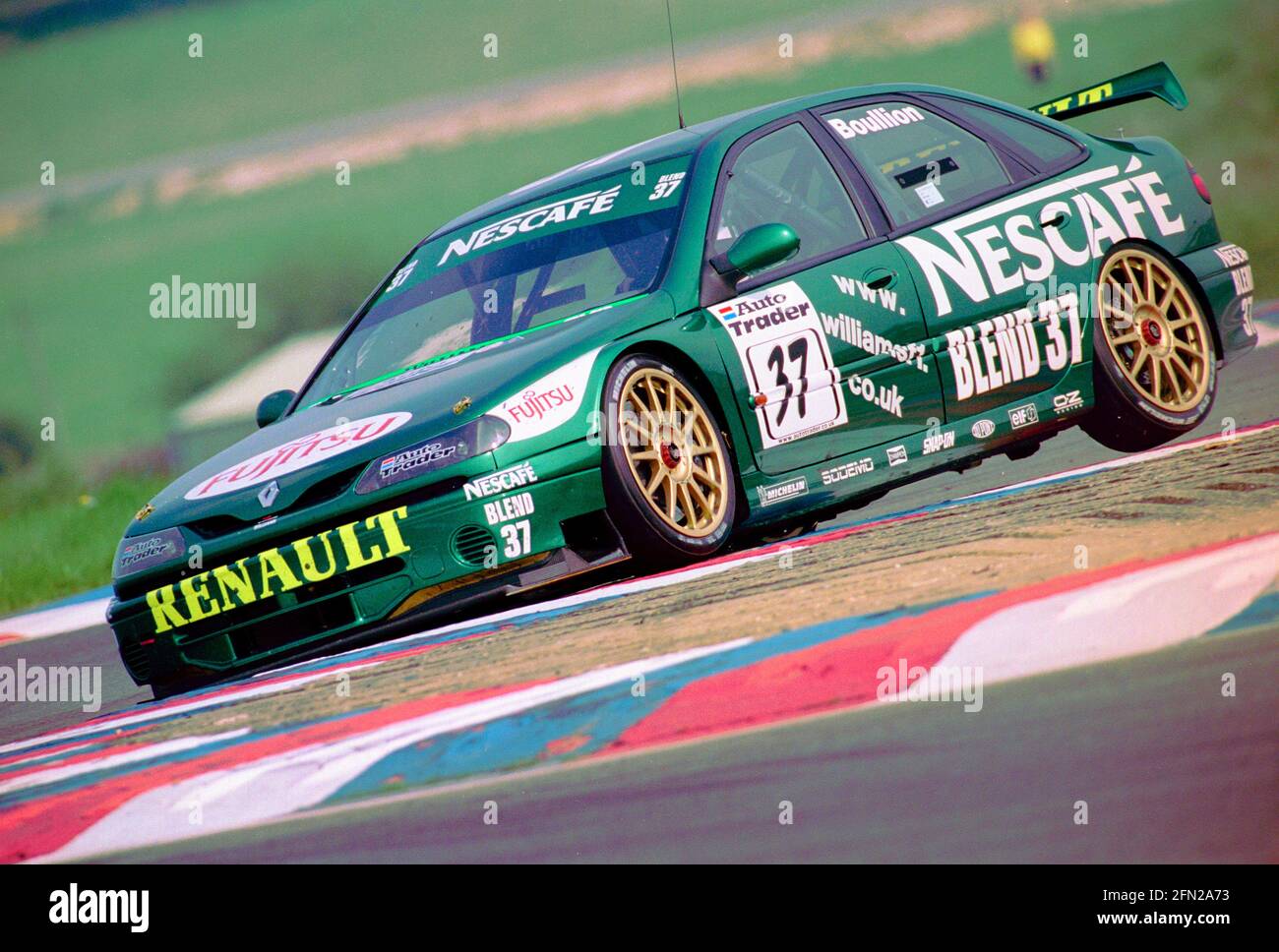 Jean-Christophe Boullion runs over the Club Chicane at Thruxton Circuit in the British Touring Car Championship in 1999 driving the Nescafe blend 37 Williams Renault. Stock Photo