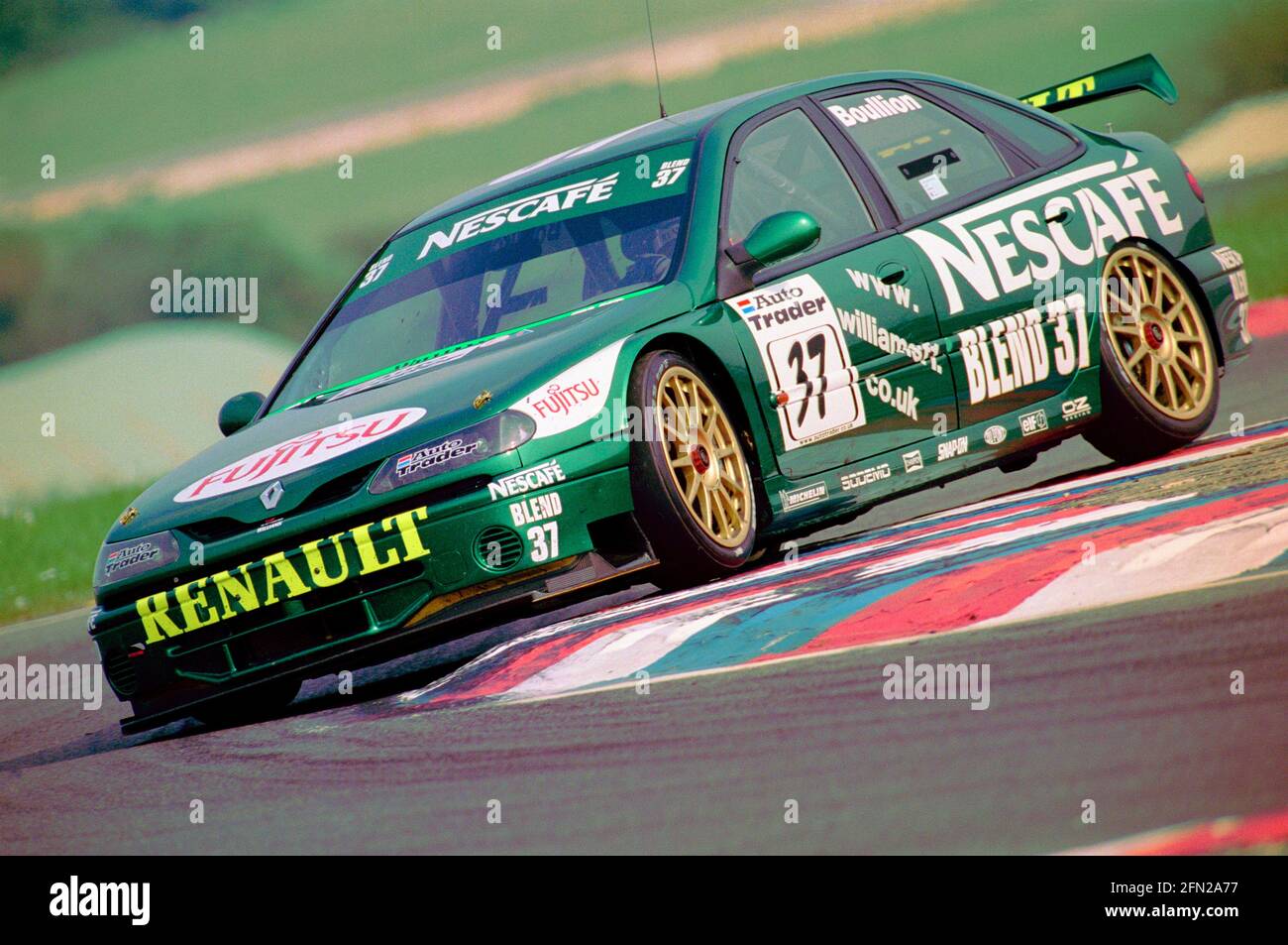 Jean-Christophe Boullion runs over the Club Chicane at Thruxton Circuit in the British Touring Car Championship in 1999 driving the Nescafe blend 37 Williams Renault. Stock Photo