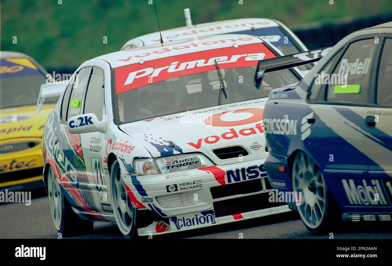 Laurent Aiello races a Nissan Primera GT in rounds 5 and 6 in the BTCC championship at Thruxton Circuit in 1999 Stock Photo