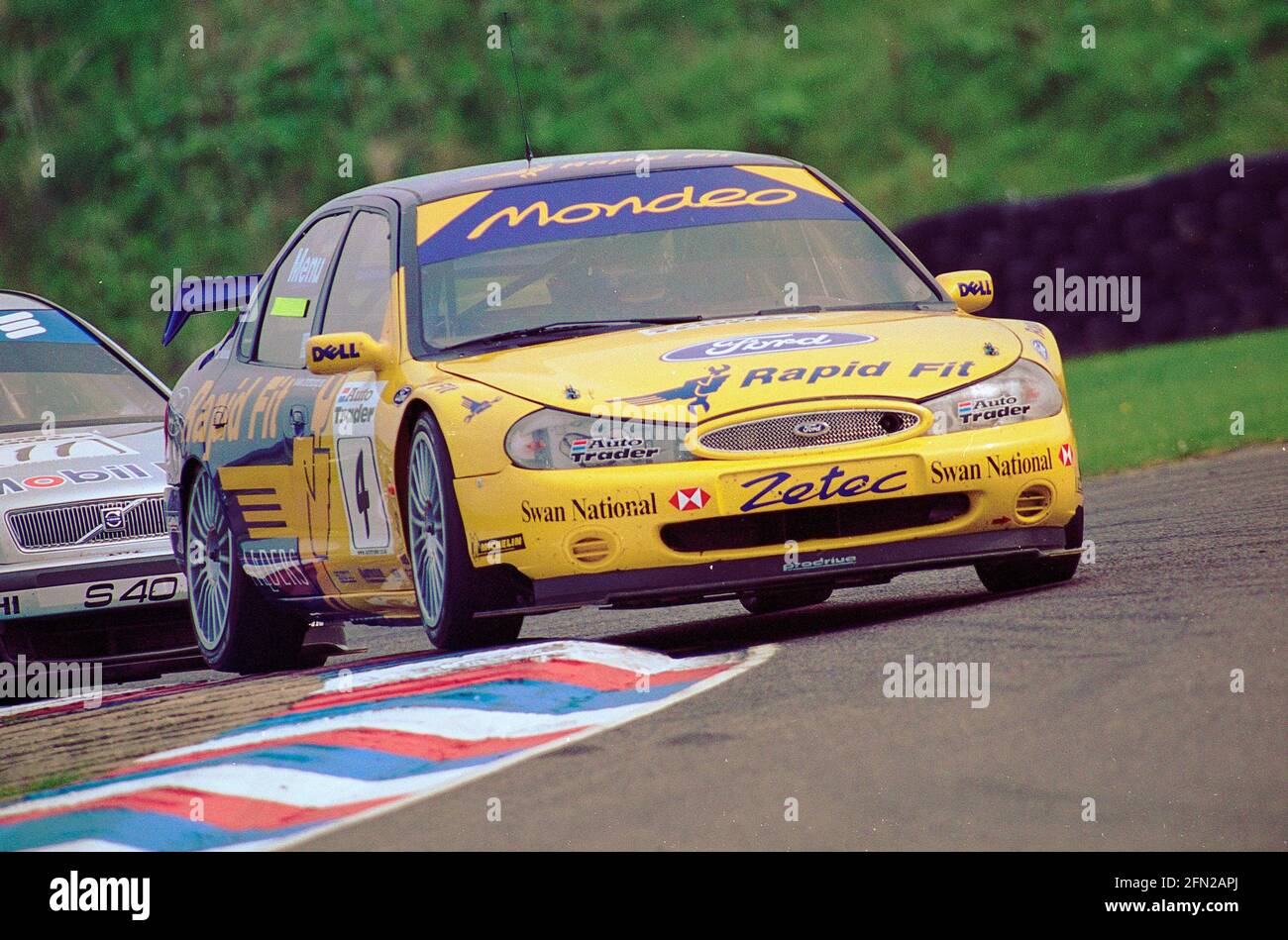 Alain Menu racing in his Ford Mondeo in the 5th and 6th round of the 1999 BTCC at Thruxton race circuit. Stock Photo