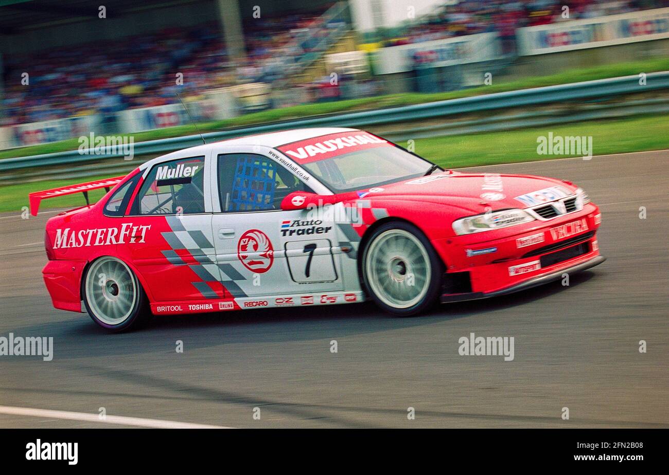 Yvan Muller racing in his Vauxhall Vectra at Thruxton race track near Andover England racing in the British Touring Car championship in 1999. Stock Photo