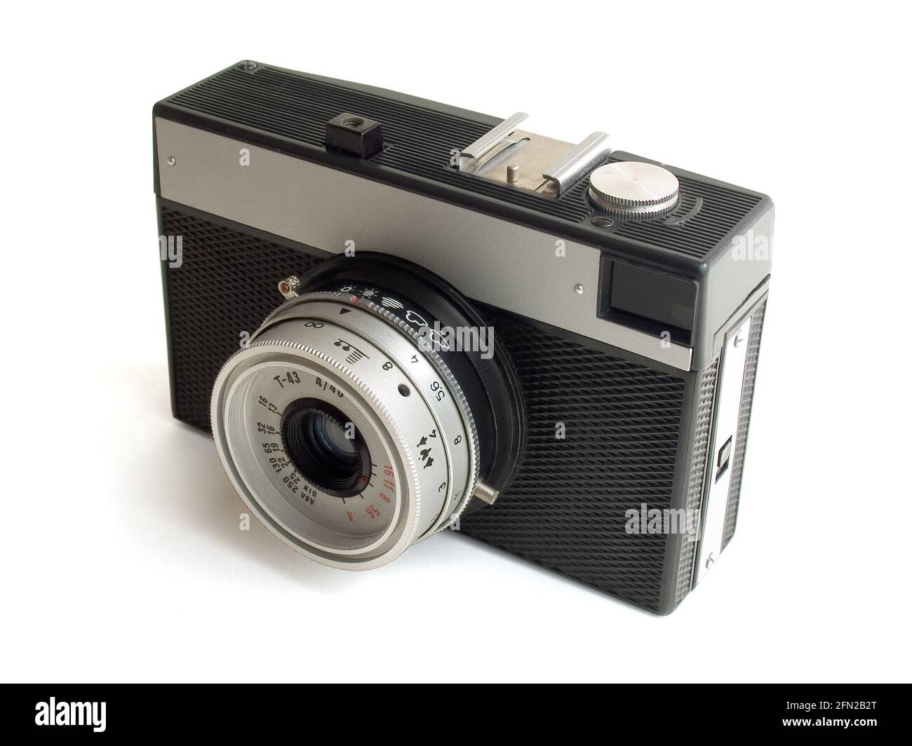 Old Camera over the white background. Stock Photo