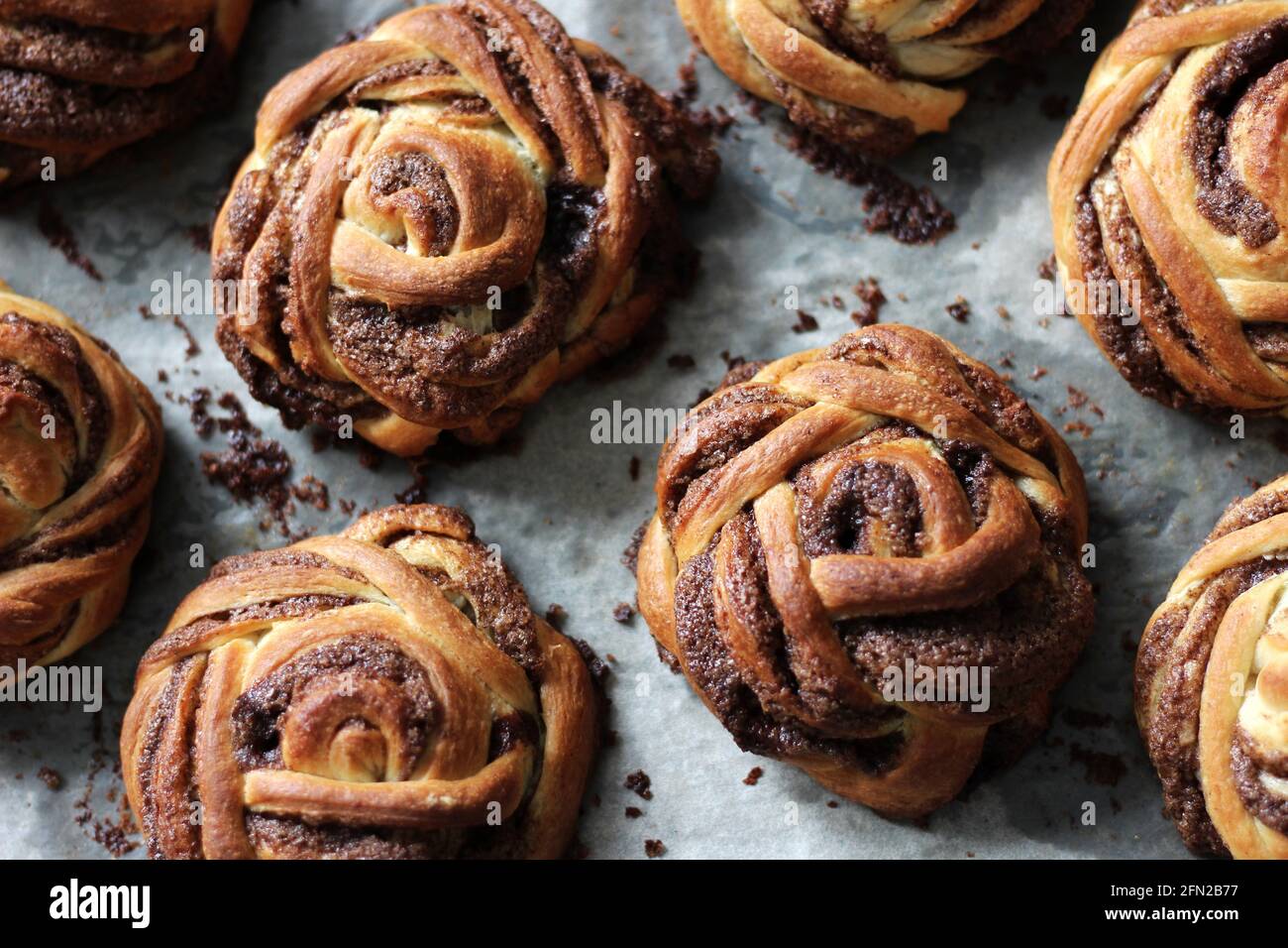 Cinnamon Buns on Baking Tray. Homemade Bakery. Stock Photo