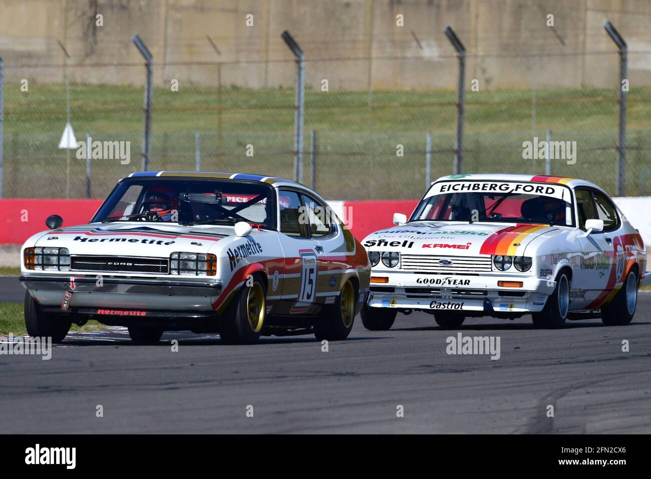 A pair of Capri's at the exit of McLeans, John Spiers, Tiff Needell, Ford Capri, Marcus Jewell, Ben Clucas, Ford Capri, Historic Touring Car Challenge Stock Photo