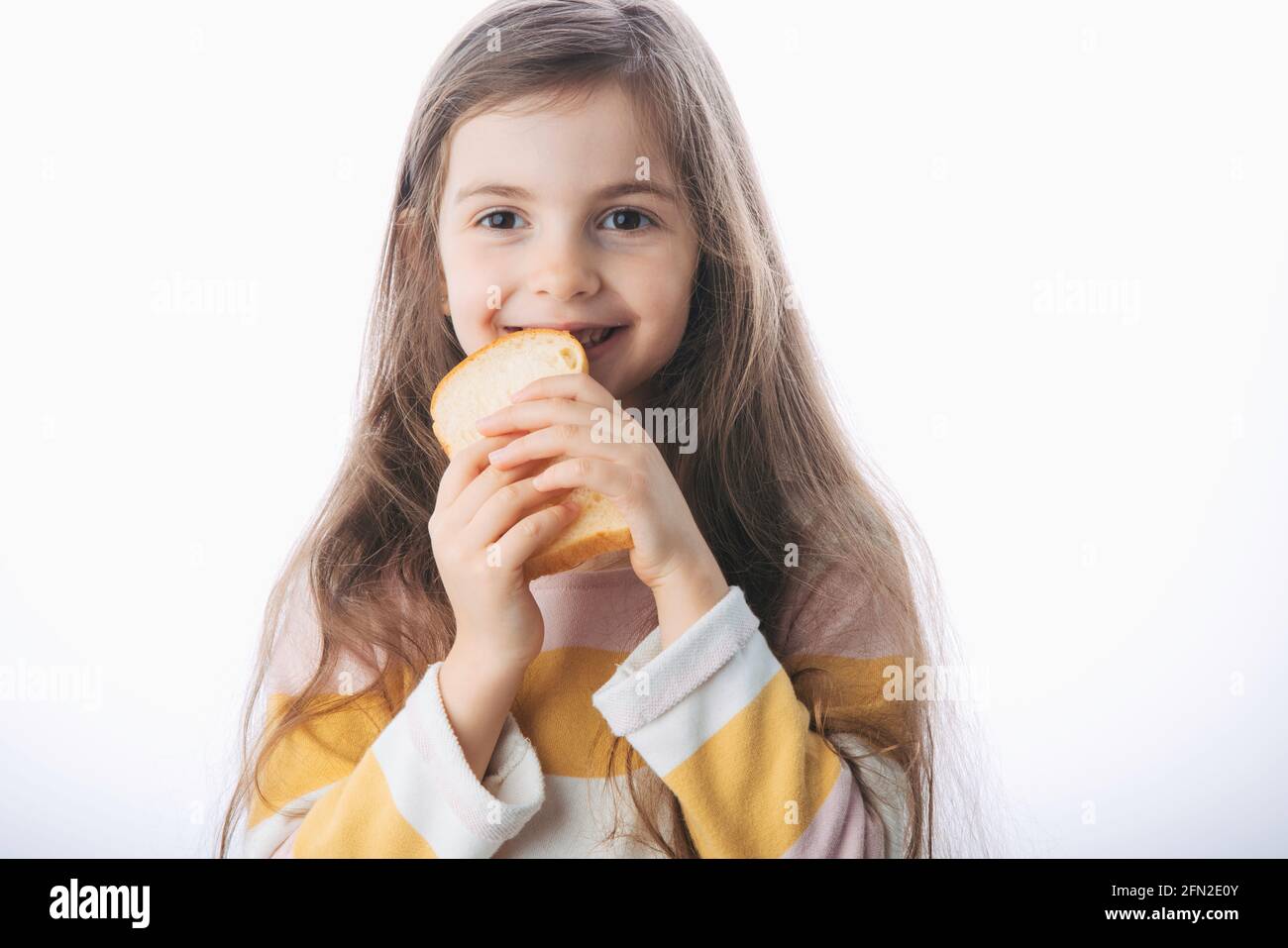 Little girl hold slice of homemade healthy bread Stock Photo Alamy