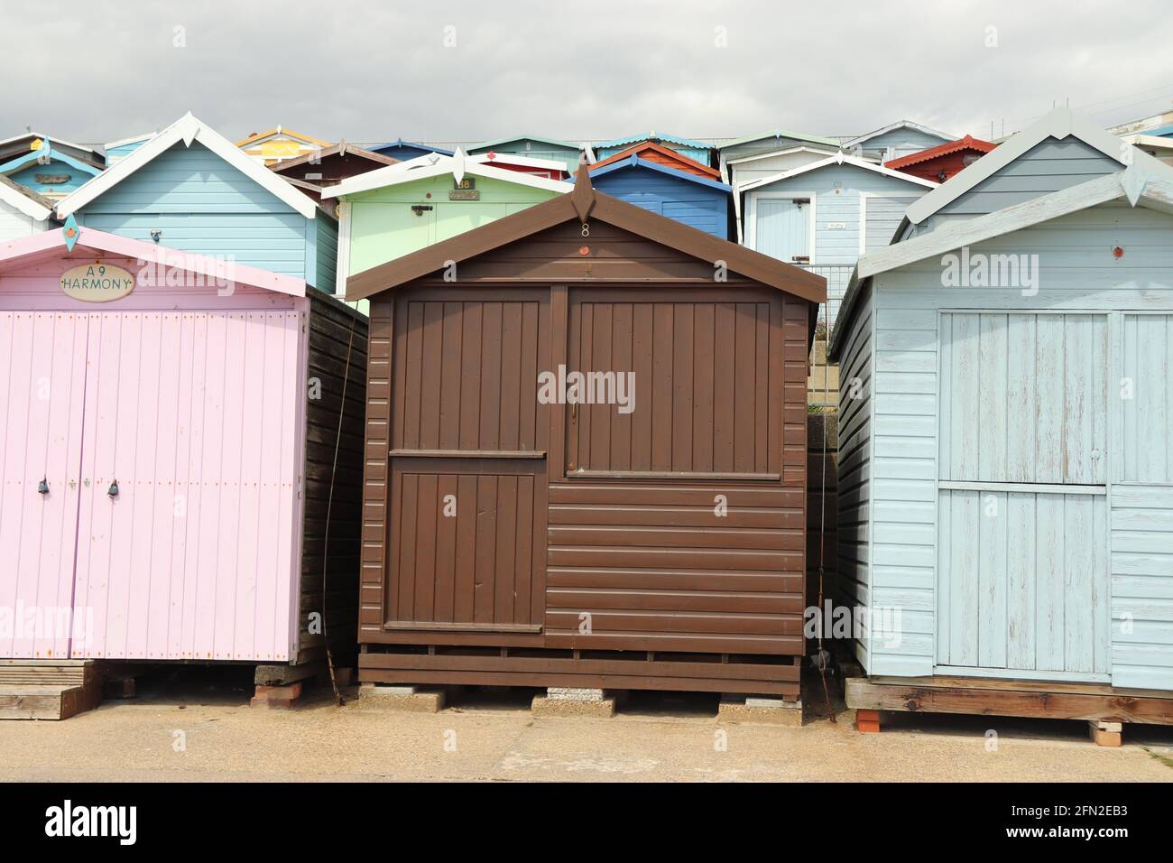 Colourful Beach huts at walton On The Naze Essex UK Stock Photo