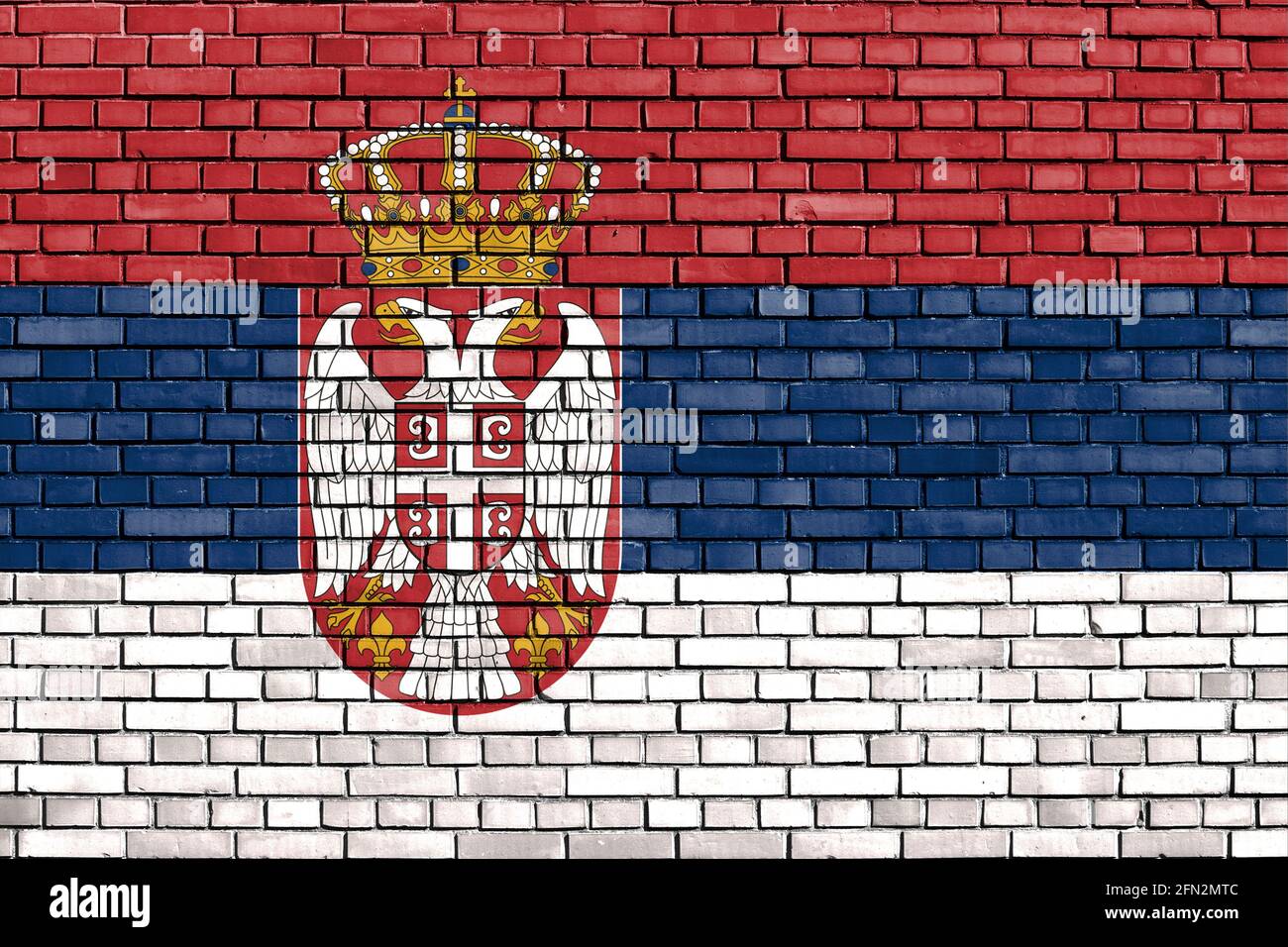 flag of Serbia painted on brick wall Stock Photo