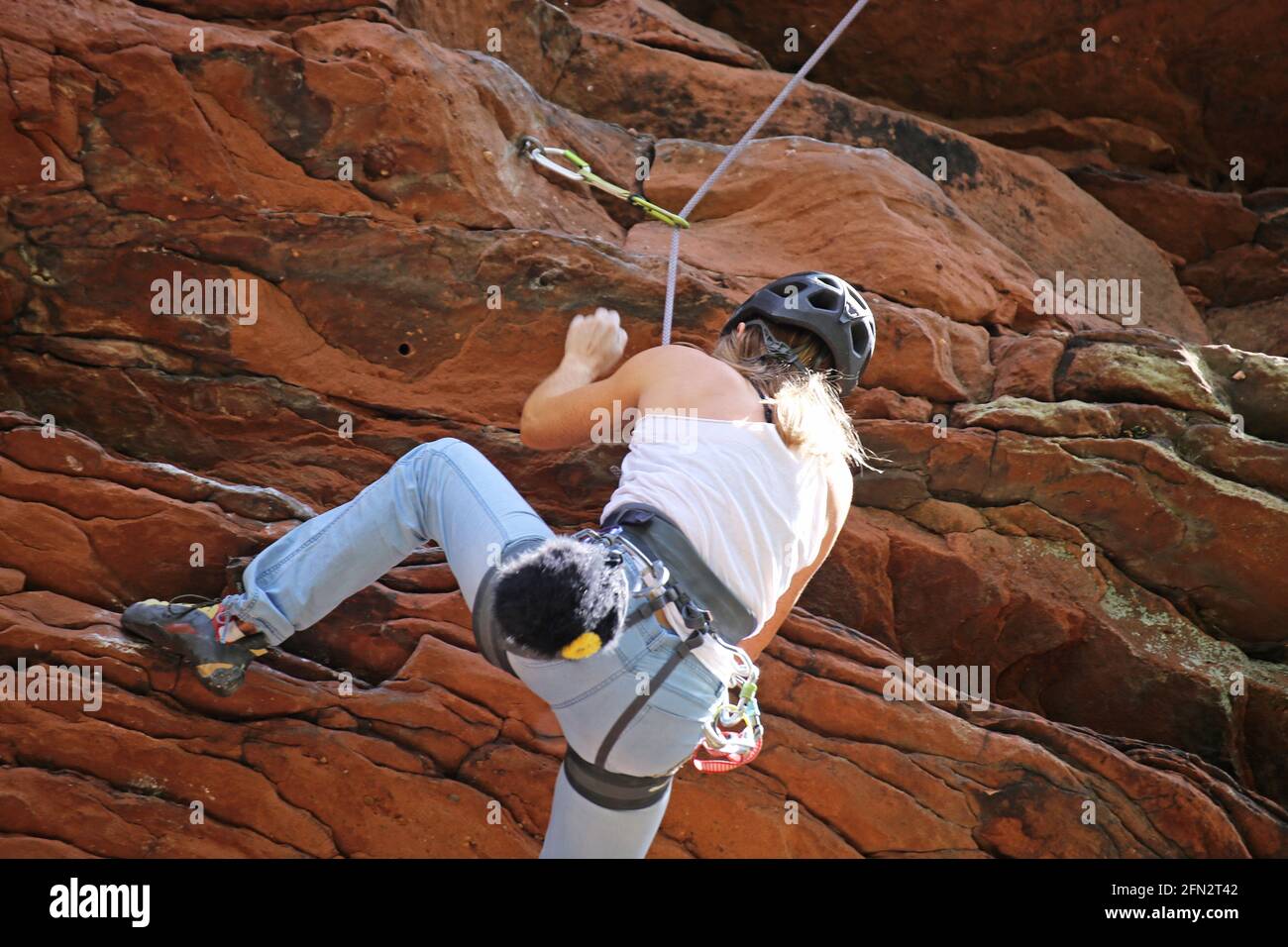 Sporty climber in Dahner Felsenland, Rhineland-Palatinate, Germany Stock Photo