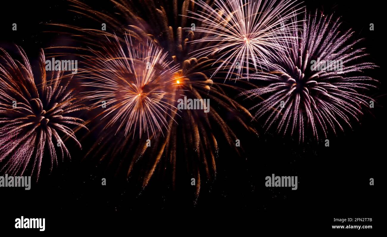 Bright fiery fireworks against hi-res stock photography and images - Alamy