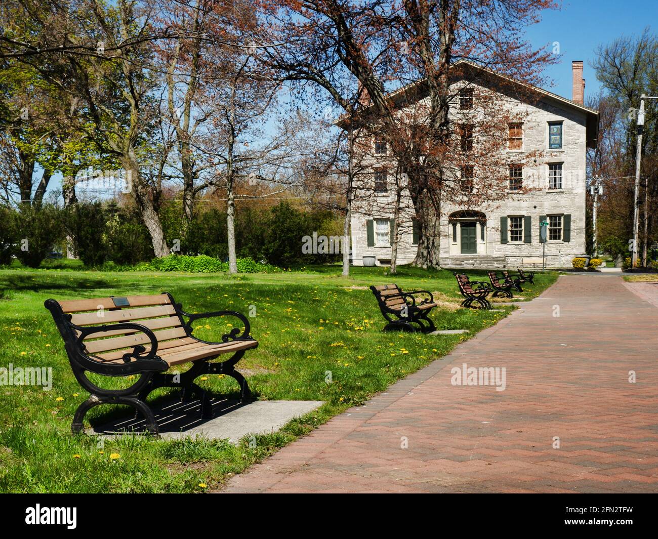 Sackets Harbor, New York, USA. May 12, 2021. Benches along West Main