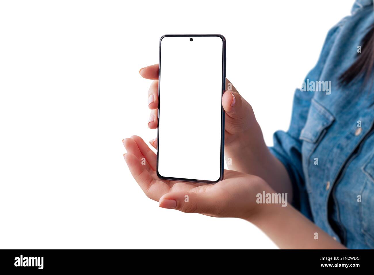 Woman holding smart phone in front, vertical position and show isolated display for app design presentation. Isolated background Stock Photo