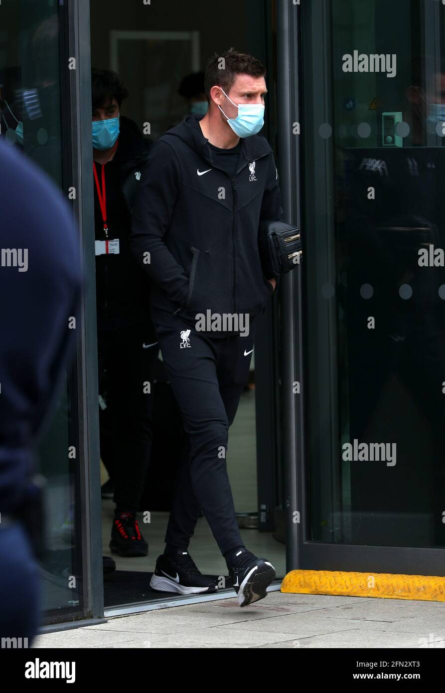 Liverpool's James Milner exits the hotel before boarding the team bus,  ahead of the Premier League match between Manchester United and Liverpool  at Old Trafford, Manchester. Picture date: Thursday May 13, 2021