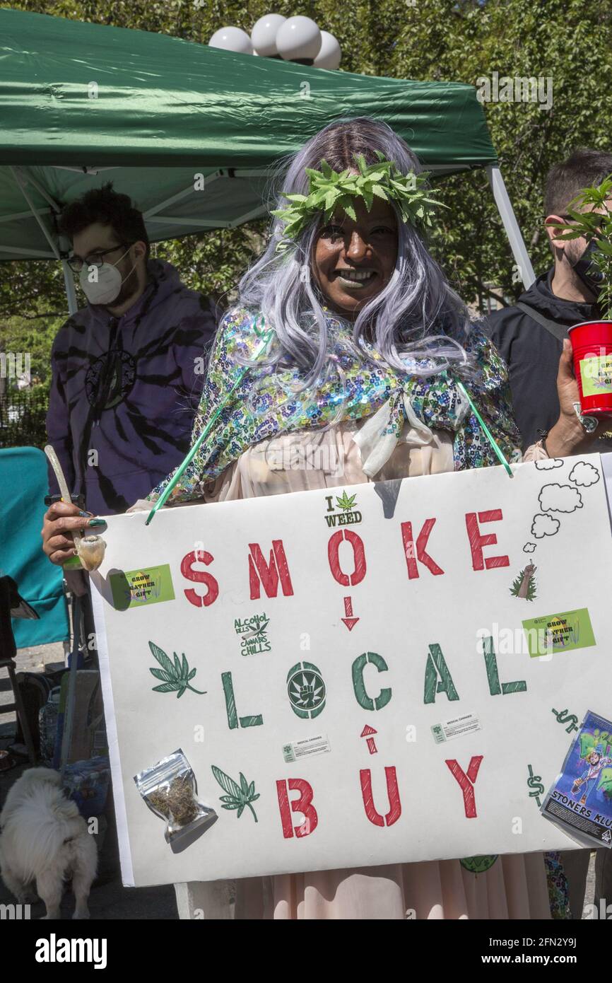 Propnants of marijuana legalization perform on May Day at Union Square in New York City. May Day, also called Workers' Day or International Workers' Day, day commemorating the historic struggles and gains made by workers and the labour movement, observed in many countries on May 1. Stock Photo