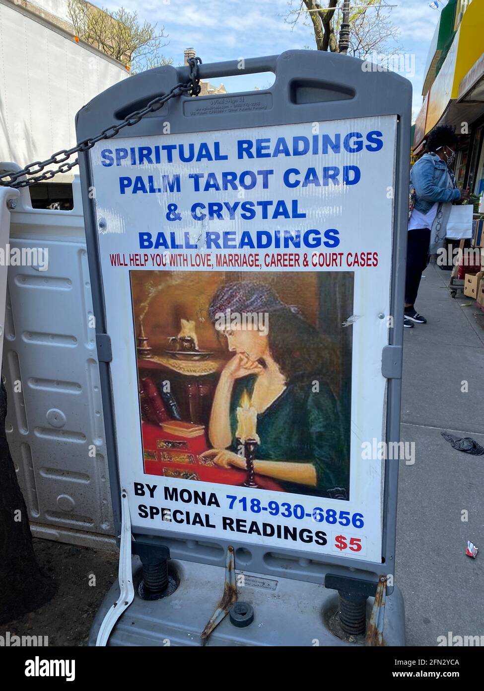 Sign for readings by a psychic for those looking to know the future. Business is up for psychics in these uncertain times of the Covid-19 pandemic. Brooklyn, New York. Stock Photo