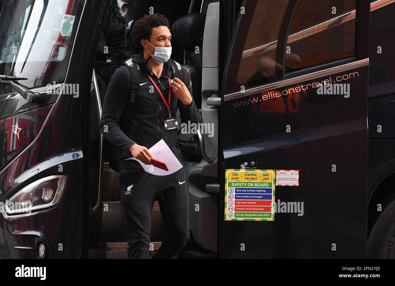 Liverpool's Trent Alexander-Arnold disembarks the team bus after arriving at the ground before the Premier League match at Old Trafford, Manchester. Picture date: Thursday May 13, 2021. Stock Photo