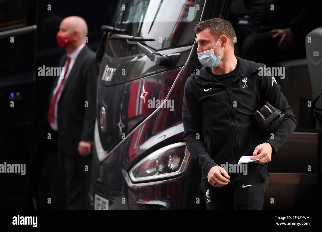 Liverpool's James Milner disembarks the team bus after arriving at the ground before the Premier League match at Old Trafford, Manchester. Picture date: Thursday May 13, 2021. Stock Photo