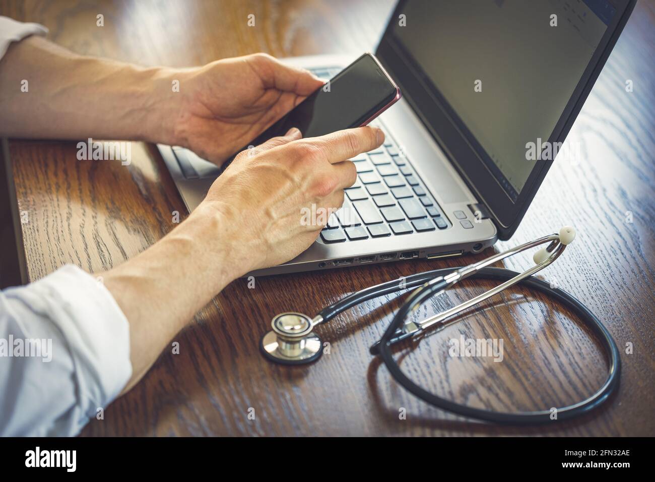 Telemedicine, doctor giving remote advice and diagnose Stock Photo