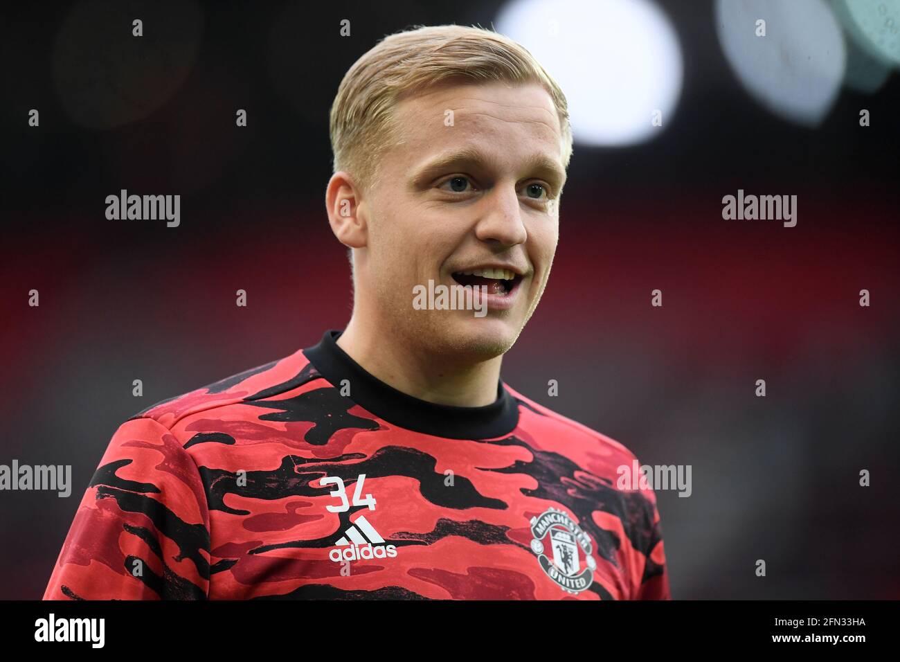 Manchester United's Donny van de Beek warming up before the Premier League match at Old Trafford, Manchester. Picture date: Thursday May 13, 2021. Stock Photo