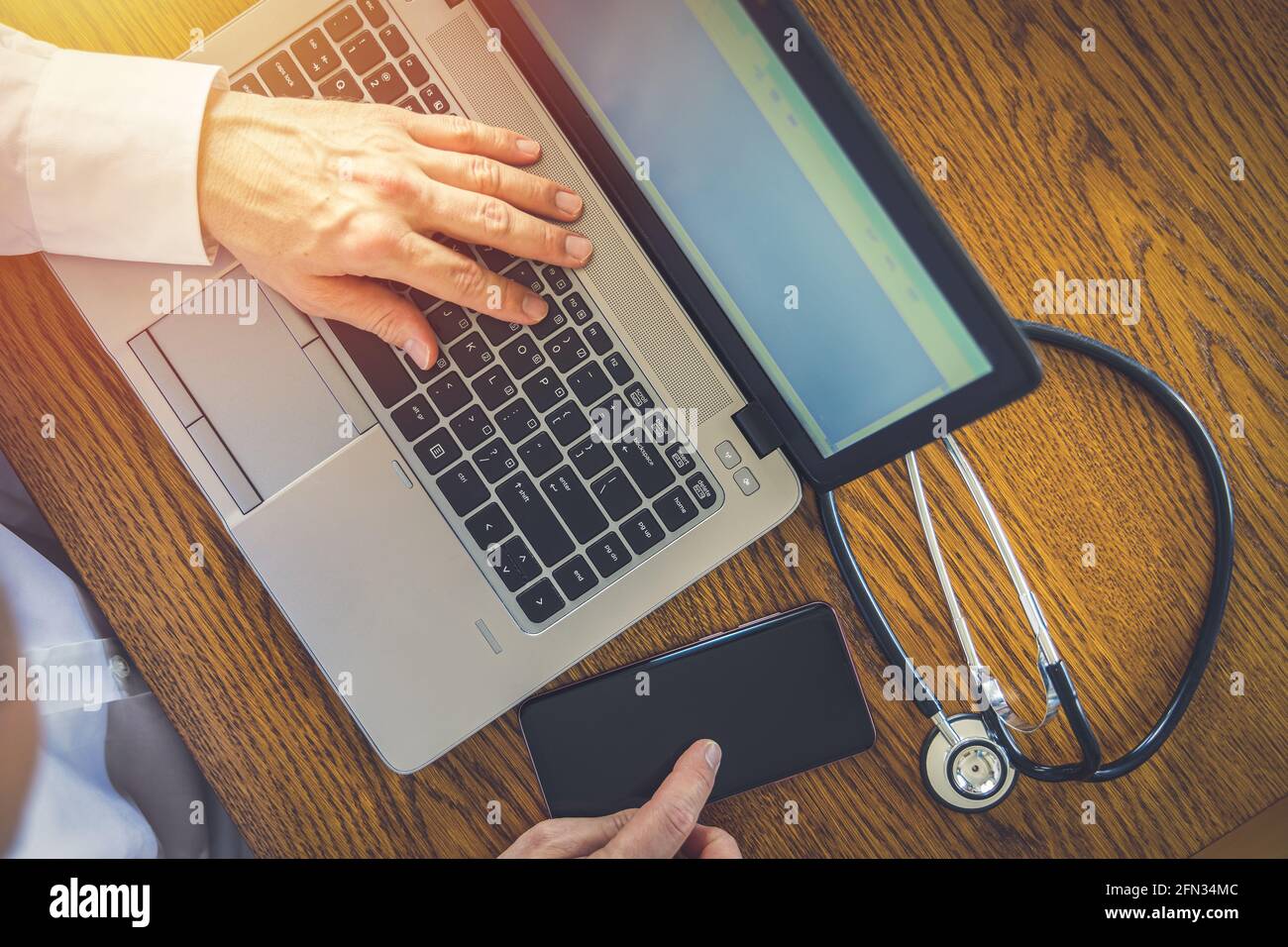 Telemedicine, doctor giving remote advice and diagnose Stock Photo