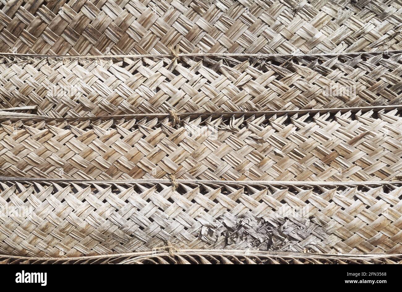 Dried woven palm leaf wall, natural background Stock Photo Alamy