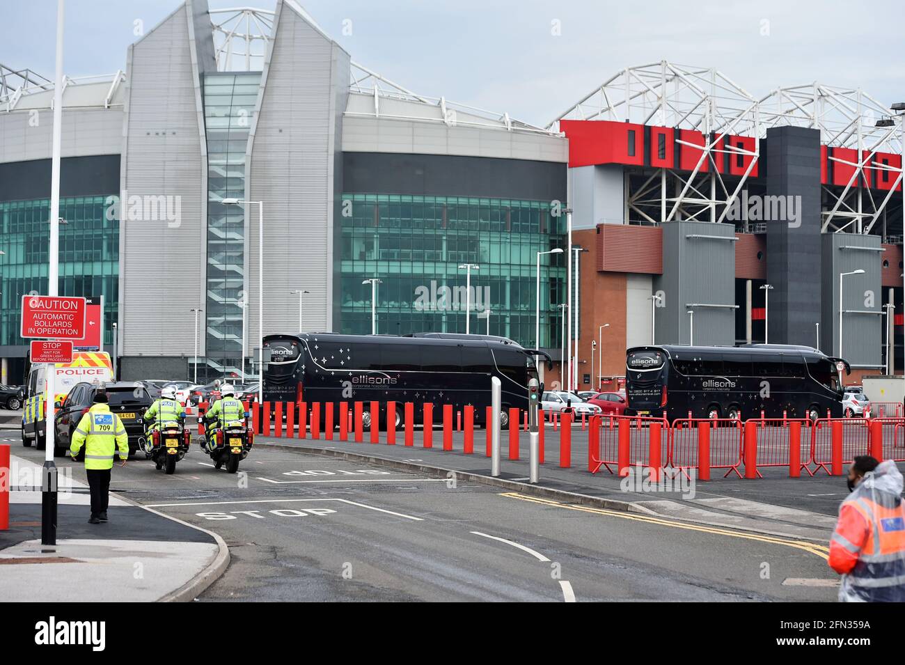The Liverpool team bus arrives under a police escort before the Premier ...