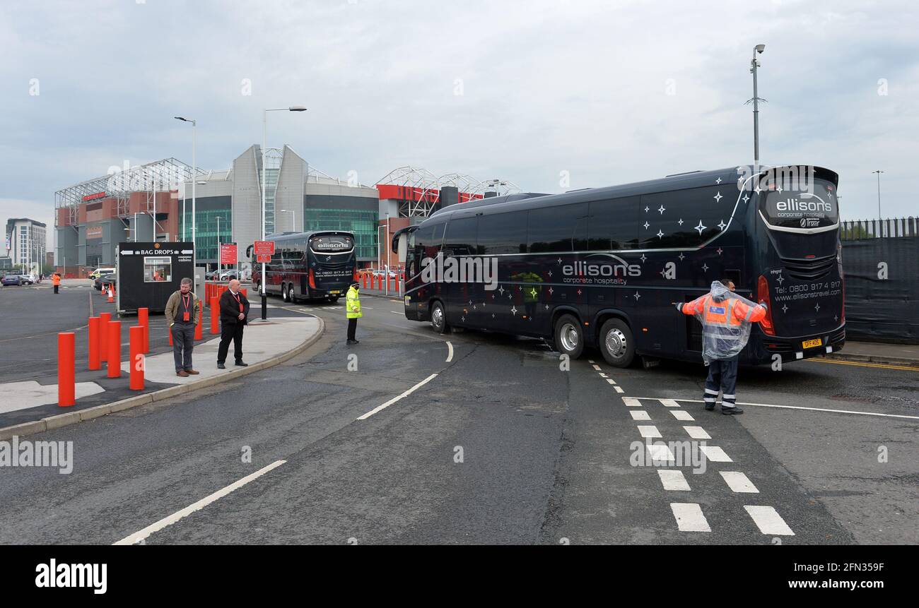 The Liverpool team bus arrives under a police escort before the Premier ...