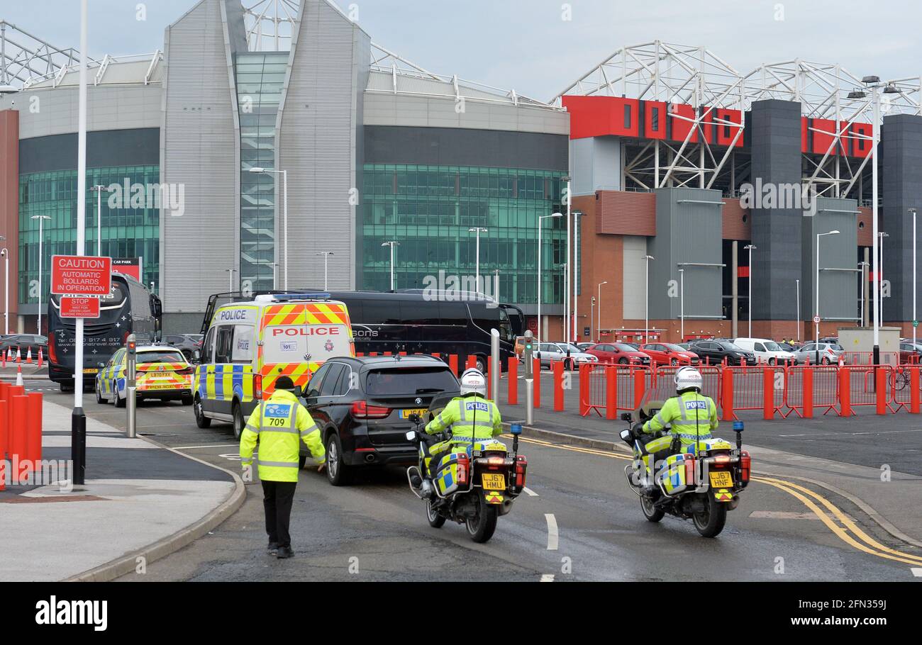 The Liverpool team bus arrives under a police escort before the Premier ...