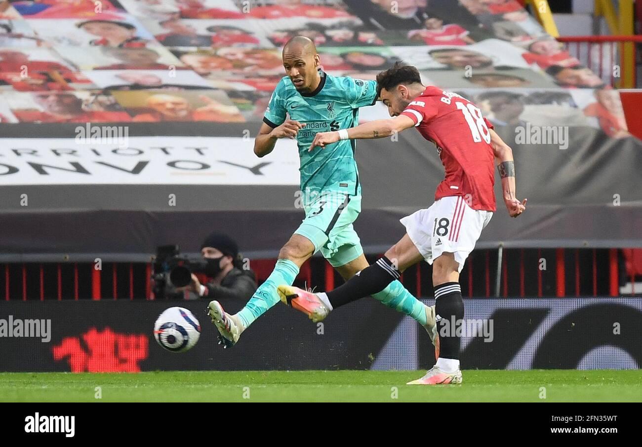 Manchester United's Bruno Fernandes scores their side's first goal of the game during the Premier League match at Old Trafford, Manchester. Picture date: Thursday May 13, 2021. Stock Photo