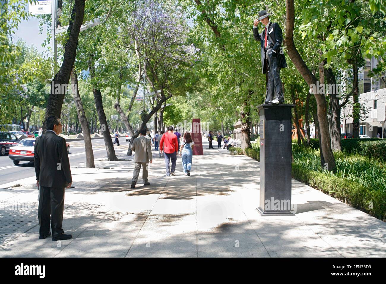 Man looks at sculpture on Avenida Paseo de la Reforma, Mexico City, Mexico Stock Photo
