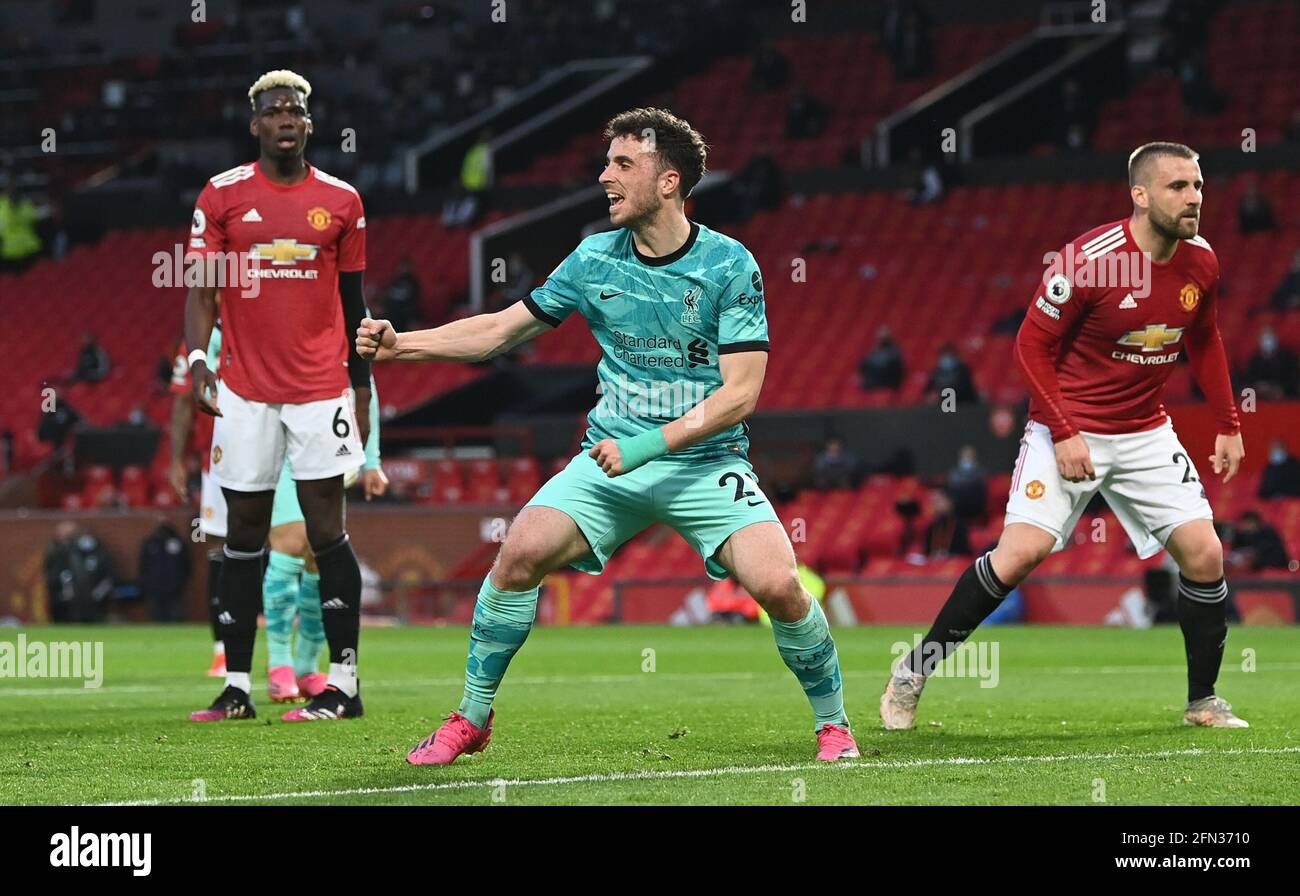 Liverpool's Diogo Jota celebrates scoring their side's first goal of the game during the Premier League match at Old Trafford, Manchester. Picture date: Thursday May 13, 2021. Stock Photo
